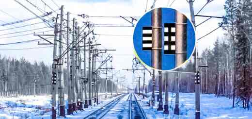 Воздушный промежуток и нейтральная вставка контактной сети. Что означают чёрно-белые полоски на опорах?